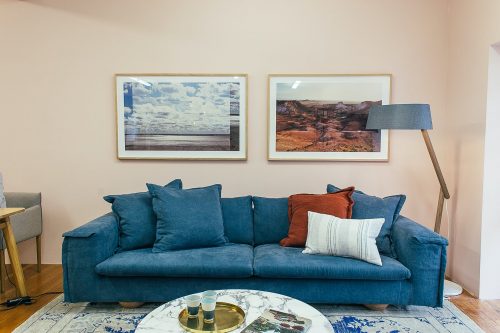 blue couch in a cozy living room